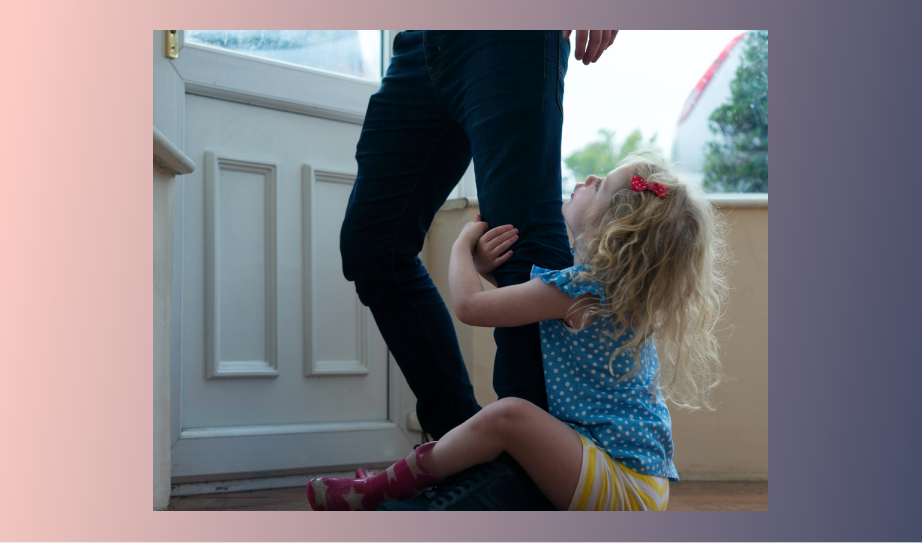 child holding onto parent